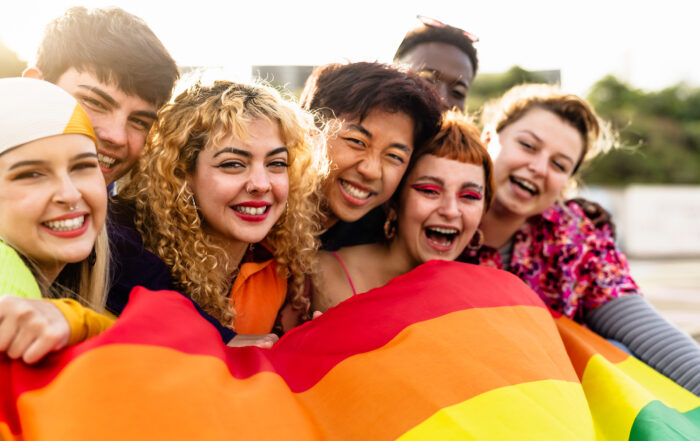 Diverse young friends supporting their loved ones who are LGBTQIA+